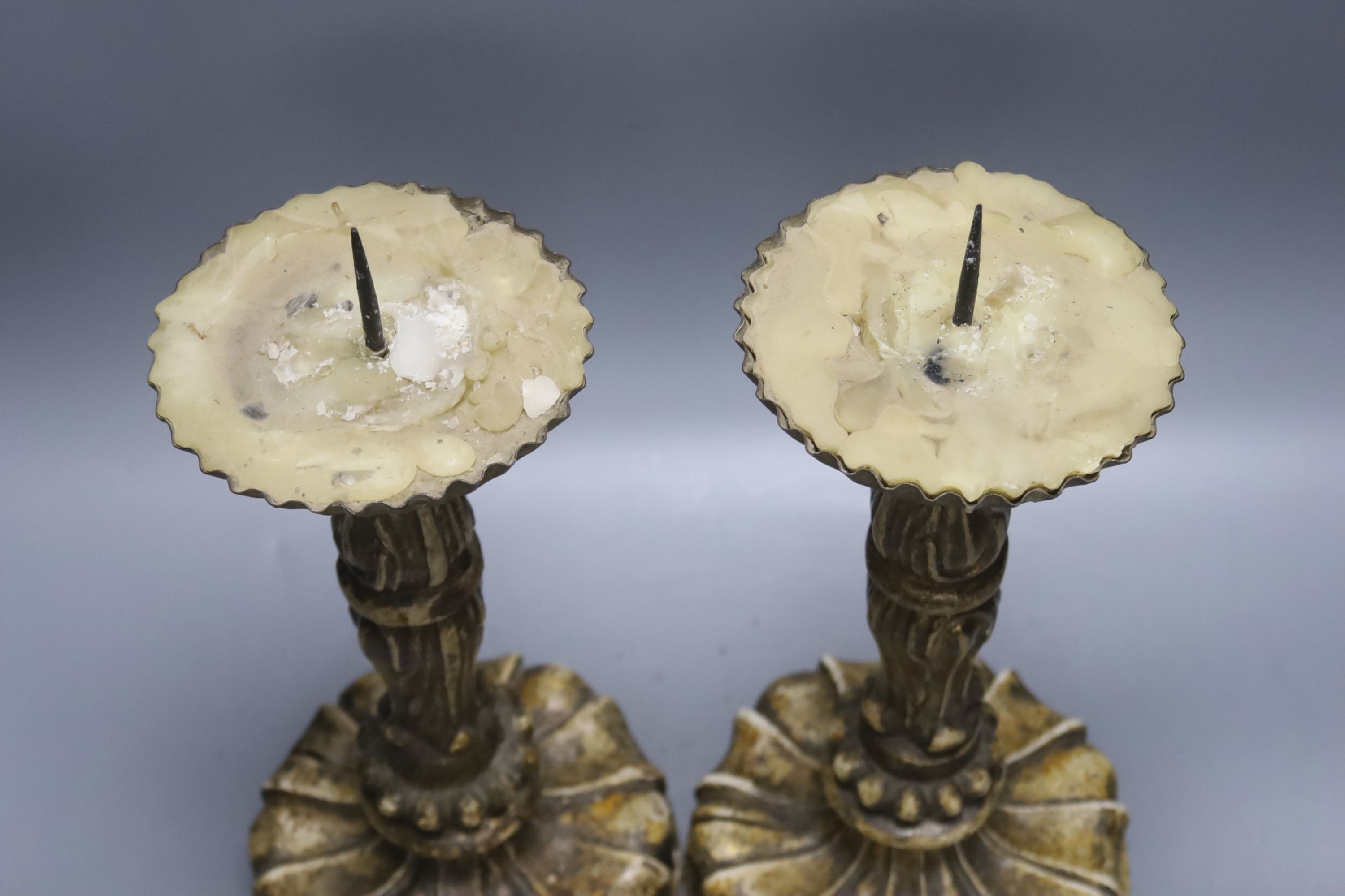 A pair of giltwood and gesso pricier candlesticks in the 17th century Italian style, height 29cm